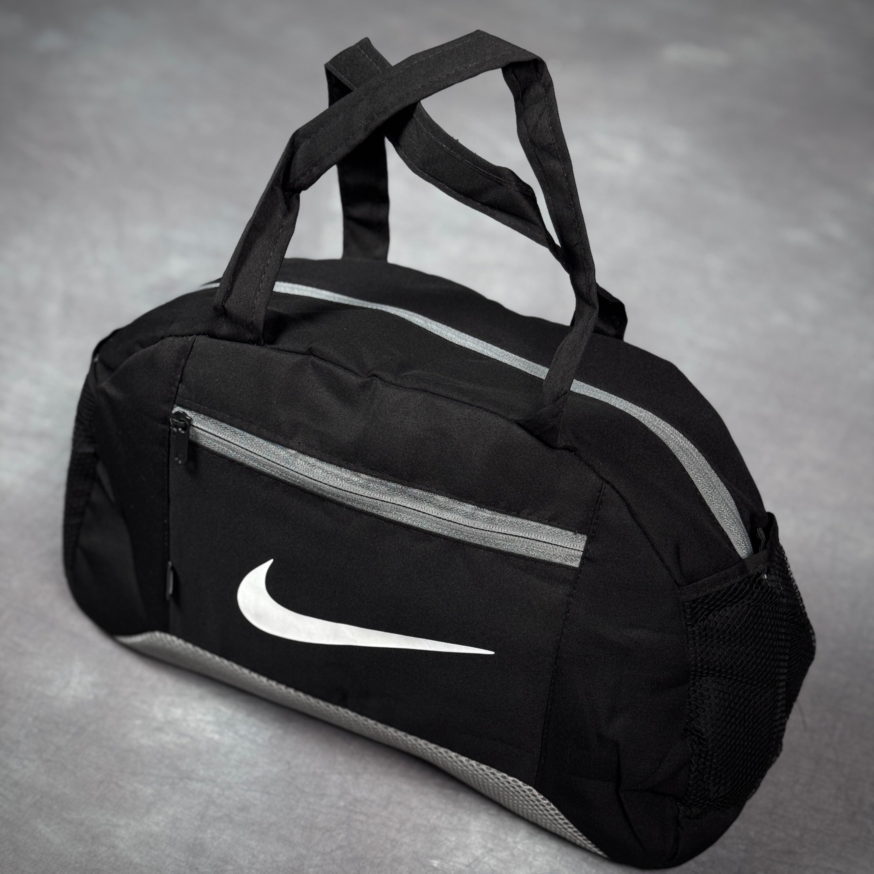 حقيبة متوسطه علامه نايك